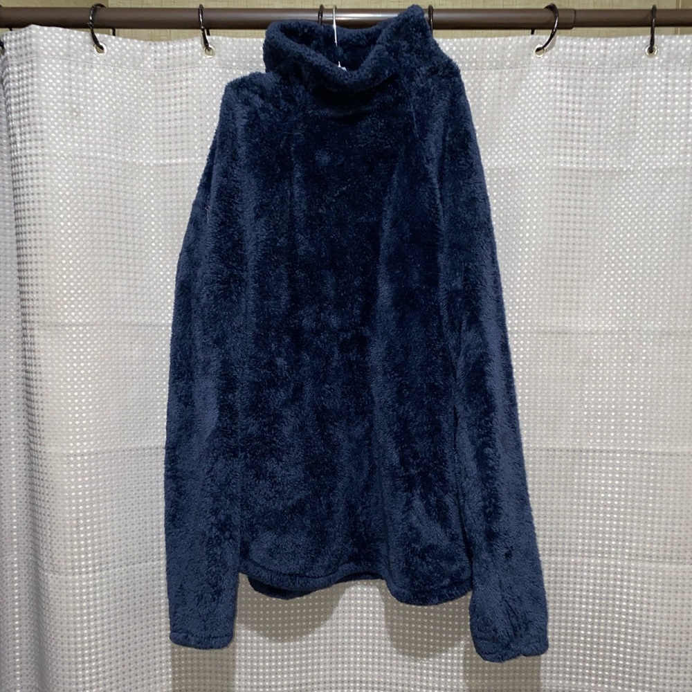 No tags but fits as a baggy medium maybe a large. Navy blue soft sweater.
